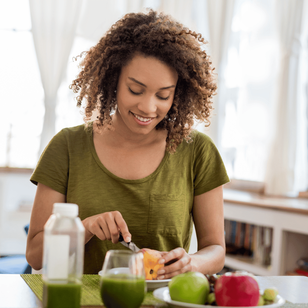 A woman feeling nourished while doing a liver cleanse