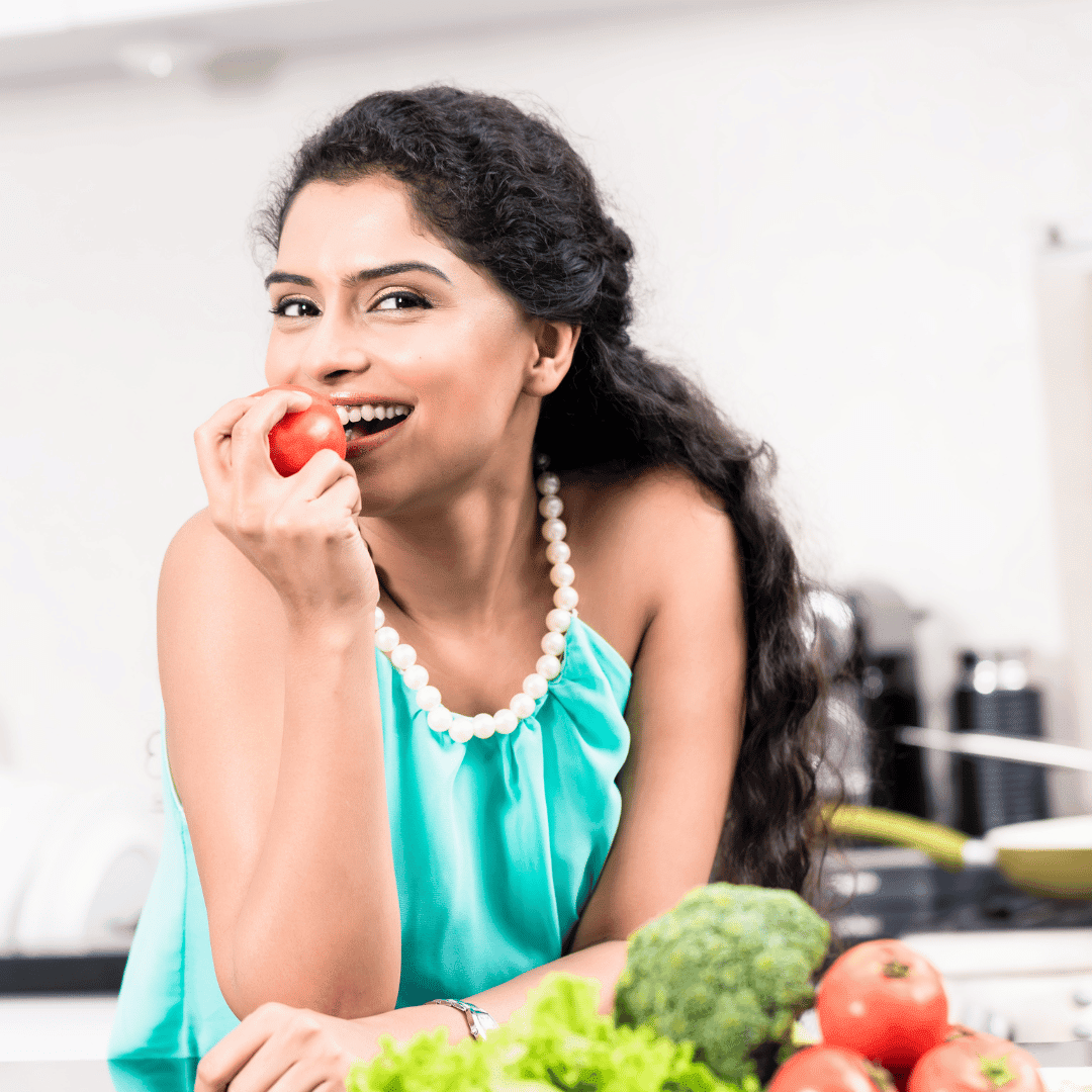A woman feeling nourished while doing a liver cleanse