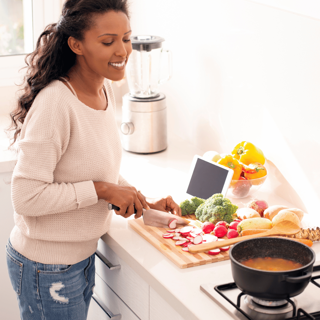 Woman preparing foods that support liver health and detoxification