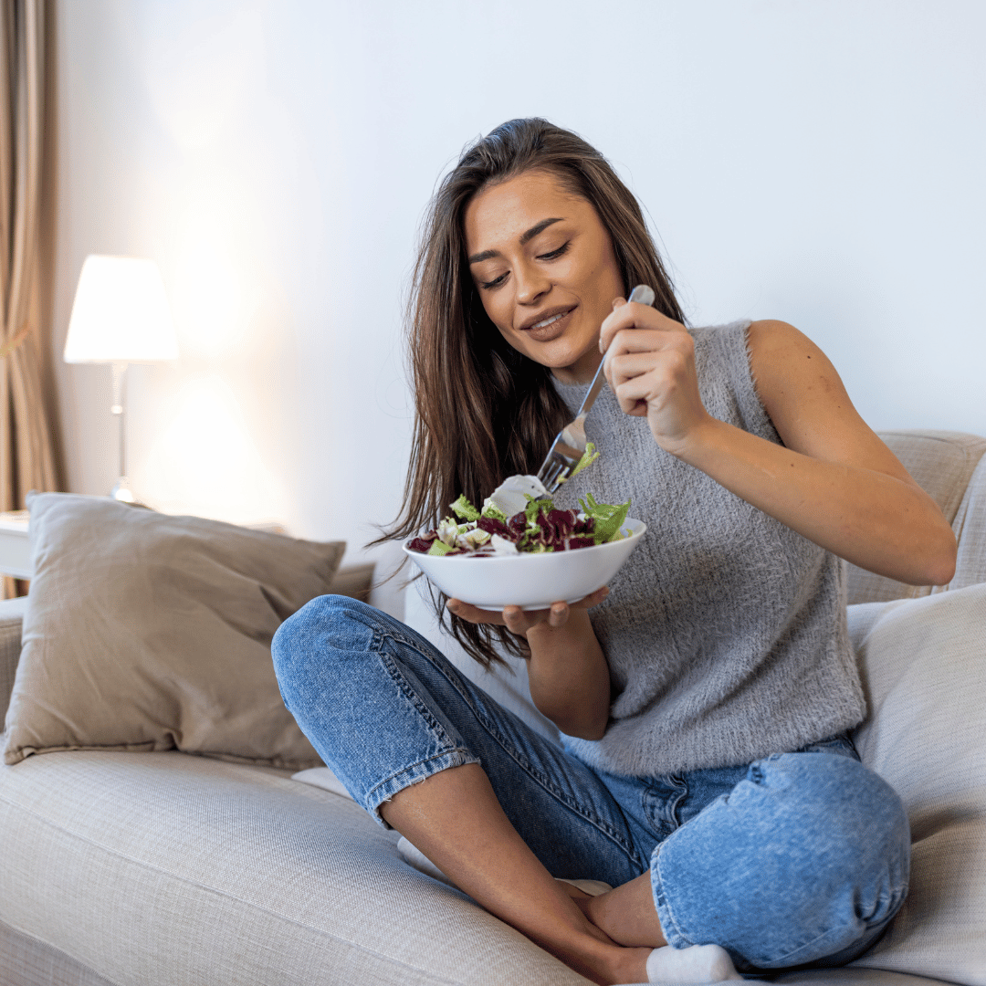 A woman feeling nourished while doing a liver cleanse