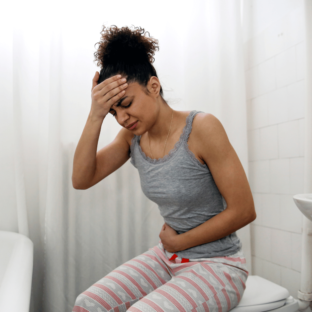 Woman with digestive discombort from constipation