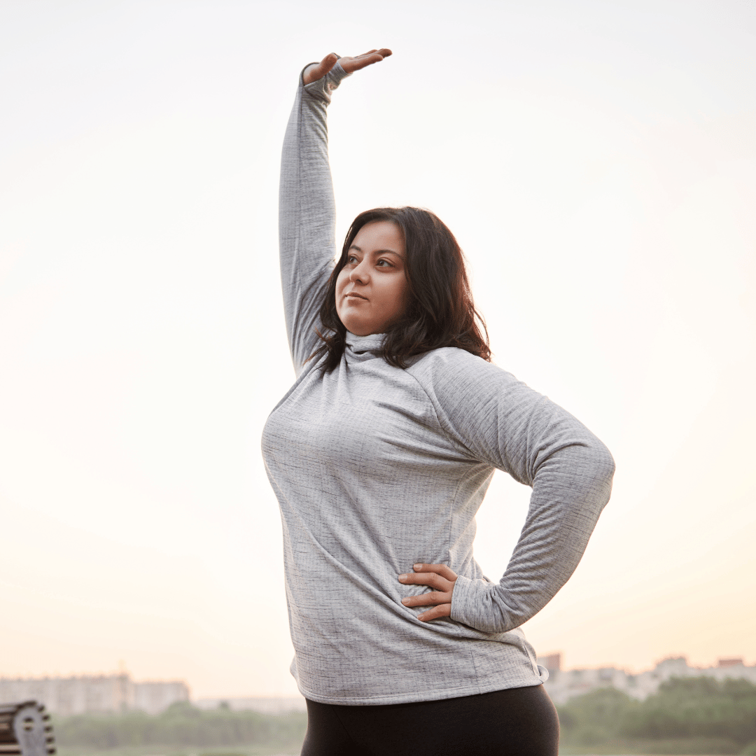 Woman taking a weight loss drug and exercising in order to heal her metabolic syndrome