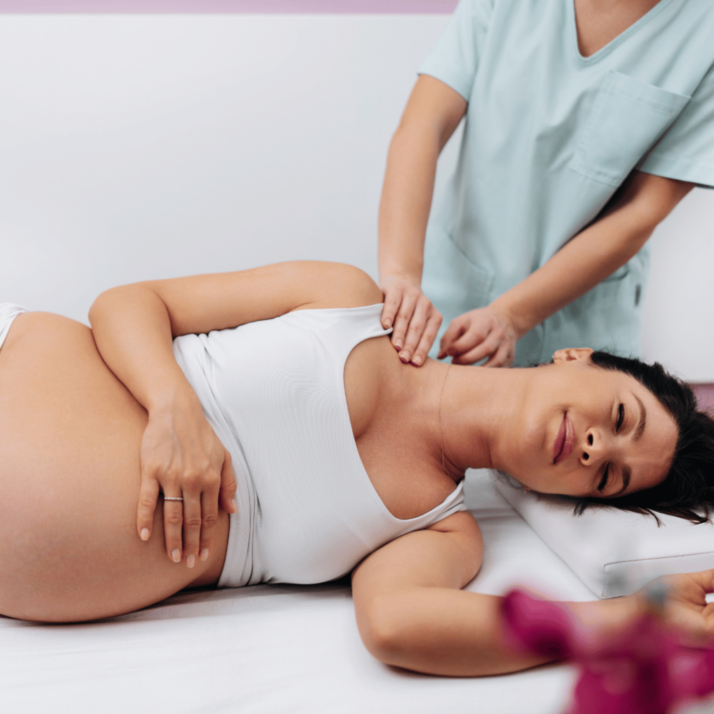 Woman receiving acupuncture during pregnancy